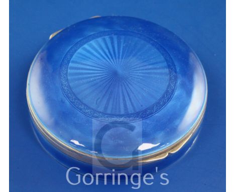 A late 19th/early 20th century Swiss? 935 standard silver and blue guilloche enamel circular box with hinged cover, with sunb