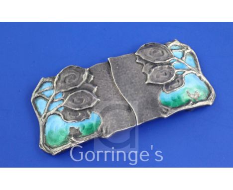 An Edwardian Art Nouveau silver and enamel buckle by George Lawrence Connell, decorated with stylised flowers and two colour 