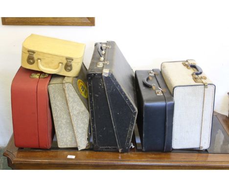 six vintage cases, including 2 accordion cases a make up case and three various size suit cases (6)