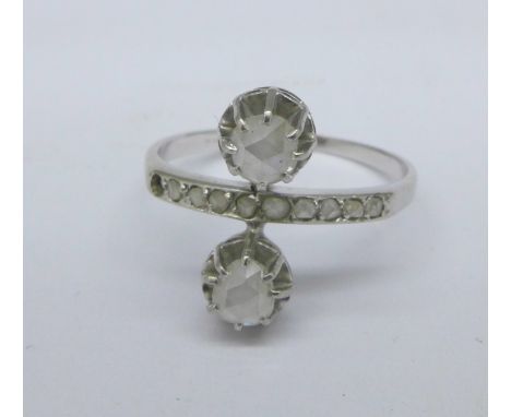 An Art Deco, white metal set rose cut diamond ring, lacking one stone, 2.9g, R, hallmark worn