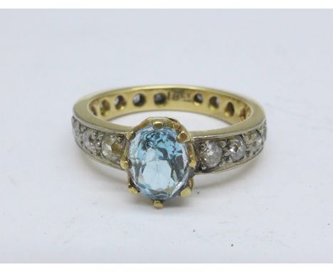 An 18ct gold, blue stone and diamond ring, 4.3g, K