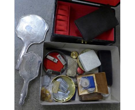 A lacquered jewellery box, coins, an enamelled compact, cigar cutters, etc.