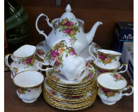 A Royal Albert Old Country Roses six setting tea service and six dinner plates, twenty-seven pieces in total