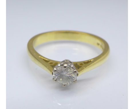 An 18ct gold and diamond solitaire ring, 3.9g, P