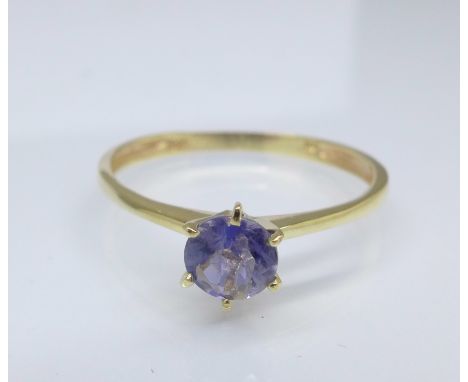 A 9ct gold and blue stone ring, 0.9g, O