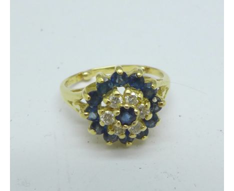 An 18ct gold, sapphire and diamond cluster ring, 3.9g, H