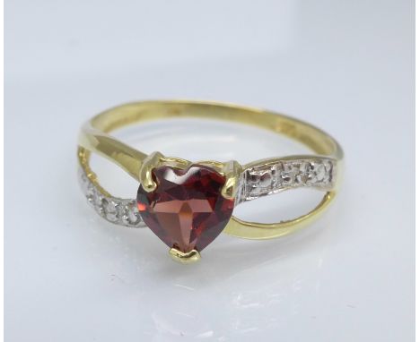 A 9ct gold, garnet and diamond ring, 1.1g, O