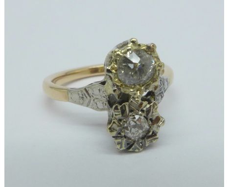 An 18ct gold, platinum set, two stone diamond ring, 3.4g, K