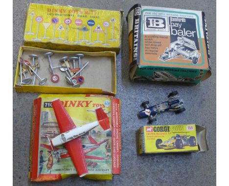 Four die-cast toys, Dinky Toys 710 and 771, Corgi Toys 159 and Britains Bamfords hay baler, boxed