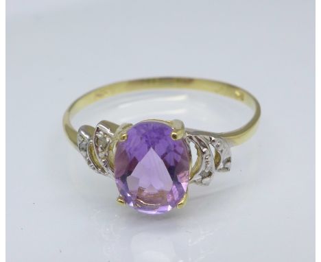 A 9ct gold, amethyst and diamond ring, 1.3g, O