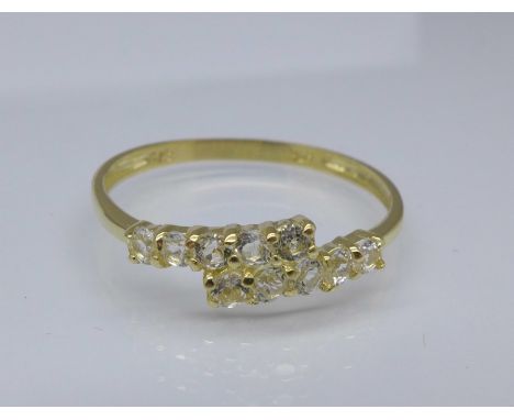 A 9ct gold and white sapphire ring, 0.8g, M