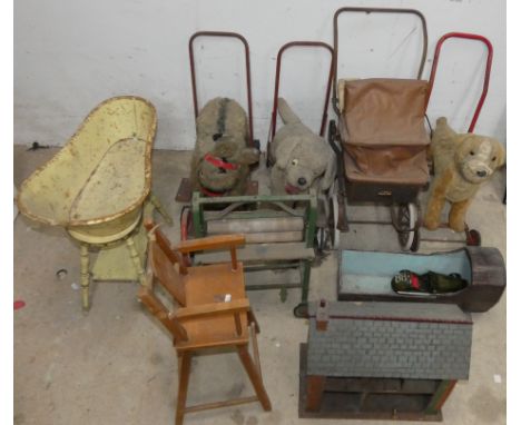 Three vintage push-along animals on wheels, together with a dolls house, dolls high chair, bathtub, stool, pram, crib and oth
