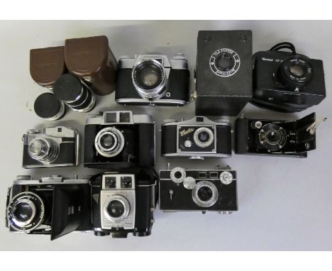 A large collection of vintage cased cameras and accessories, including a c.1910's Eastman Kodak No. 1 Folding Pocket Automati