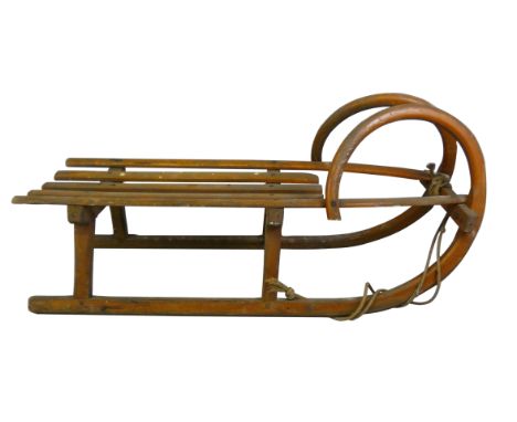 A vintage wooden sledge, total length 98 cm.  
