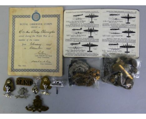 .A quantity of WWII brass cap badges and ephemera, including a Durham Light Infantry Kingsway No. 5 brass cigarette lighter, 