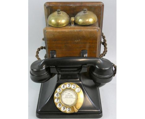 A vintage GPO bakelite telephone, the ebonised receiver with "No. 164" embossed, connected to a GPO bellset, No. 15, converte