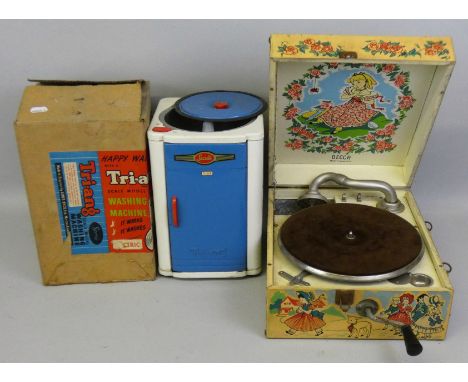 An early 1950's Decca nursery portable gramophone, registered No. 5043, the interior and exterior with nursery rhyme scenes a