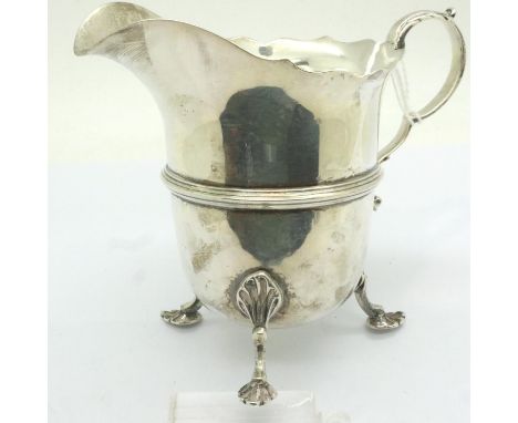 Herbert Charles Lambert hallmarked silver cream jug on three pad feet, London assay 1906, 159g. P&amp;P Group 1 (£14+VAT for 