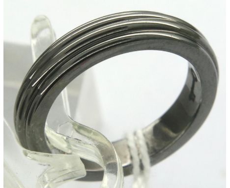 Hallmarked sterling silver Theo Fennell band ring with black oxidised finish, size K, 4.9g. Small scratches to surface, no de