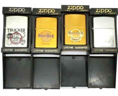 Four boxed Zippo lighters. P&amp;P Group 1 (£14+VAT for the first lot and £1+VAT for subsequent lots) 
