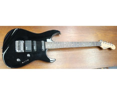 Charvel electric guitar, model no CX692, in hard case. small mark below pickups light scratches to body. P&amp;P Group 3 (£25