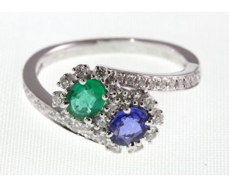 An 18ct H/M sapphire, emerald & diamond double cluster ring, size M/N