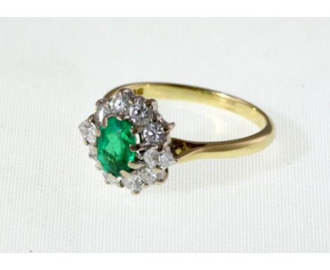 An 18ct H/M Emerald & Diamond cluster ring, total diamond weight approx 1.00ct, approx 3.5g, size N