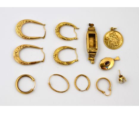 POLICE > A selection of 9ct H/M jewellery to include a St Christopher, a garnet set locket & an empty watch case , gross weig