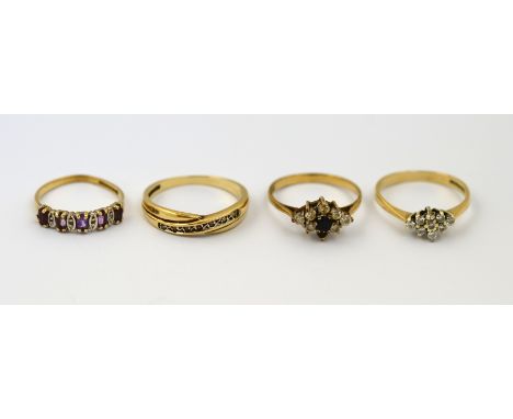 POLICE > Four 9ct H/M rings, approx gross weight 6.5g. [NO RESERVE] [VAT ON HAMMER PRICE]