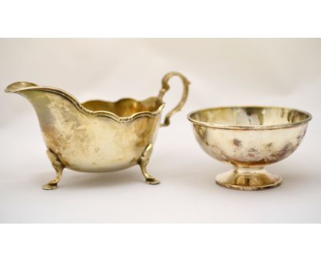 A silver sauce boat H/M Sheffield 1937 together with a plain silver sugar bowl H/M Sheffield 1967, approx total weight 216g