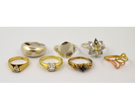 POLICE > Two 9ct H/M rings and another unmarked ring, approx total weight 6.7g, with a diamond set ring, marked 18ct, approx 