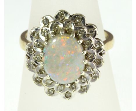 A 9ct H/M Opal & Diamond set cluster ring, size O