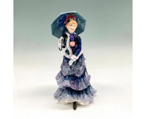 This fashionable glossy figurine was inspired by the paintings of Renoir. Her apparel is a purple and blue tiered ruffled dre