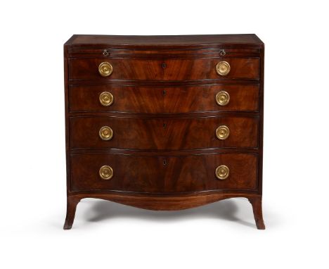 A GEORGE III MAHOGANY SERPENTINE FRONTED CHEST OF DRAWERSCIRCA 1790With a brushing slide above the long graduated solid mahog