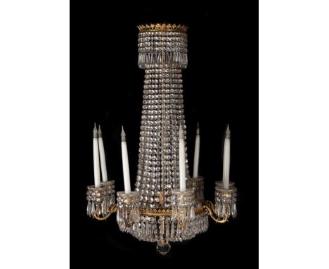 A CUT GLASS CHANDELIERIN REGENCY STYLE, 20TH CENTURYOf cascade and basket form, rose cut and icicle lustres, cut glass candle