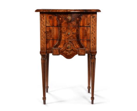 A CONTINENTAL WALNUT AND INLAID PETITE COMMODE CIRCA 1780Of shaped serpentine outline77cm high, 51cm wide, 44cm deep Conditio