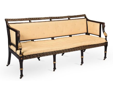 A REGENCY BLACK PAINTED AND PARCEL GILT SOFA IN THE MANNER OF THOMAS HOPE, CIRCA 181592cm high, 194cm wide, 75cm deep.Conditi