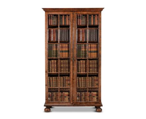 A WILLIAM AND MARY WALNUT BOOKCASECIRCA 1690, IN THE PEPYSIAN TASTE203cm high, 117cm wide, 40cm deepThis bookcase is similar 