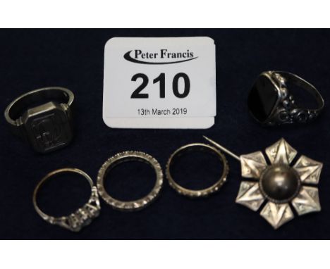 A collection of rings including a heavy 800 silver signet ring and a stick pin.(B.P. 24% incl. VAT)