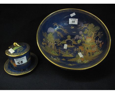 Carlton Ware oriental design blue ground gilded bowl decorated with pagodas in landscape and having printed marks, 25cm diame