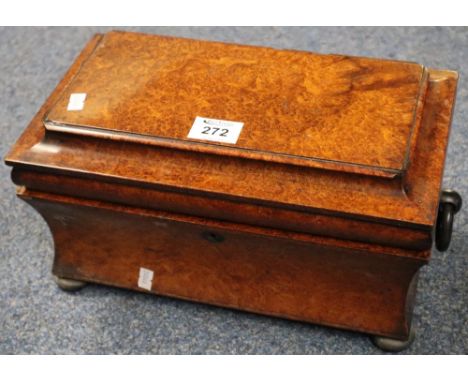 19th Century burr wood sarcophagus shaped tea caddy with two lidded containers to the interior loop handles on bun feet.(B.P.