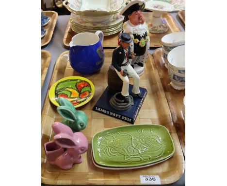 Tray of assorted china to include; Poole pin dishes, one decorated with fish, Sylvac rabbits, Lamb's navy rum advertising fig