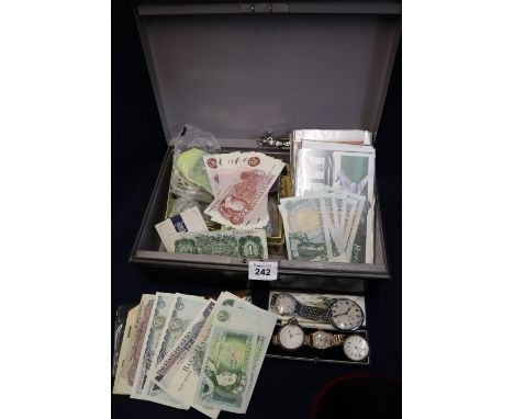 Steel strong box containing assorted coins, first day covers, military plated pocket watch, small Swiss fob watch and another