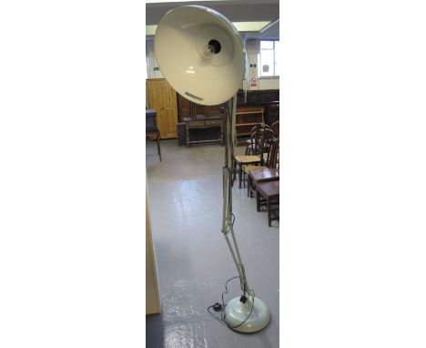 Modern turquoise anglepoise standard lamp on circular base. (B.P. 24% incl. VAT)