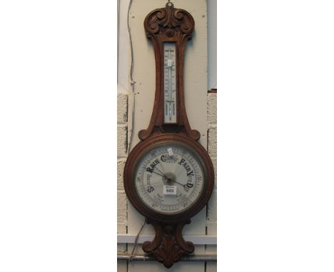 Early 20th Century carved oak banjo aneroid barometer. (B.P. 24% incl. VAT)