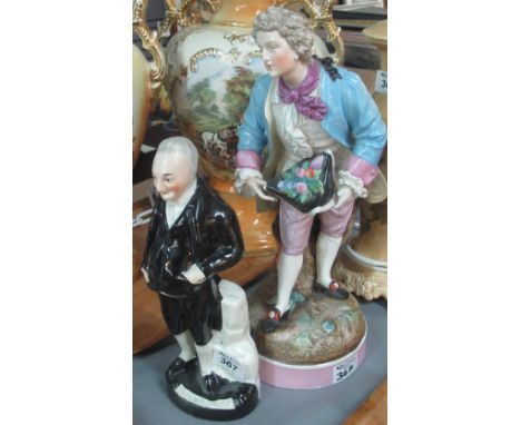 Large continental porcelain study of a figure in 18th Century dress on a circular naturalistic base, together with a 19th Cen