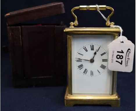 French brass carriage clock with full depth Roman dial and original leather covered carrying box. (B.P. 24% incl. VAT) CONDIT