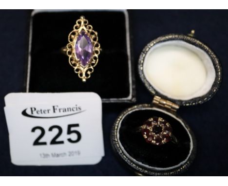 9ct gold garnet ring and a 9ct gold amethyst set ring.(B.P. 24% incl. VAT) CONDITION REPORT: Garnet ring is size K 1/2. Ameth