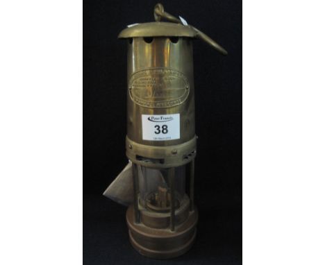 Thomas & Williams Ltd of Aberdare brass miner's safety lamp in unused condition.(B.P. 24% incl. VAT)