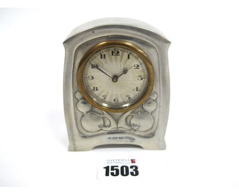 A Tudric Pewter Desk Clock, attributed to Archibald Knox for Liberty, relief decorated with stylised leaves, the face with Ar